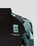 Close up of the front of the black England Ashes training top showing the crest on the chest and Castore logo in teal