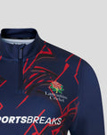 Close up of navy Womens 26/27 Performance Quarter Zip with Lancashire Cricket crest and Sportsbreaks logo