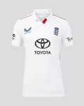 Front view of white England women's Test cricket short sleeve shirt with navy crest and Toyota sponsor
