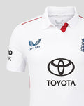 White England women's Test cricket shirt with navy Castore crest on the left, England three lions badge on the right, Toyota sponsor, and red shoulder trim.