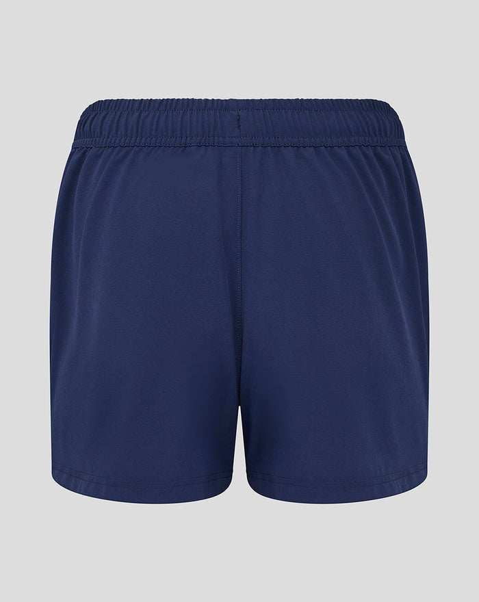 Back view of navy woven training shorts with an elastic waistband