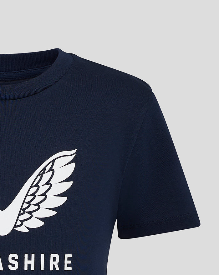 Shoulder close-up of navy Lancashire tee with white wing graphic.