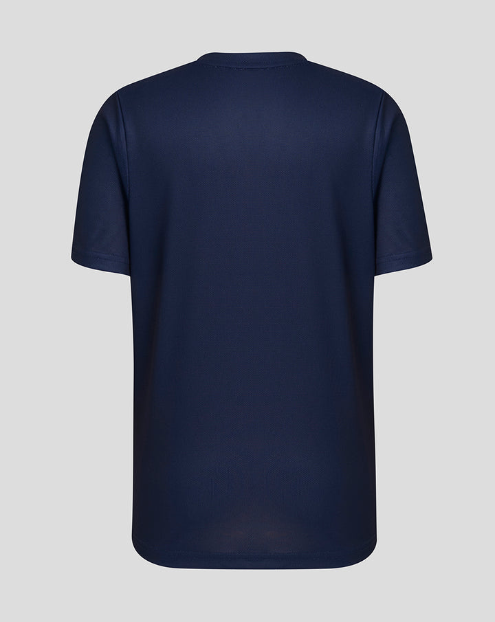 Close-up of navy junior performance tee showing neck trim branding and Lancashire Cricket crest on the chest.