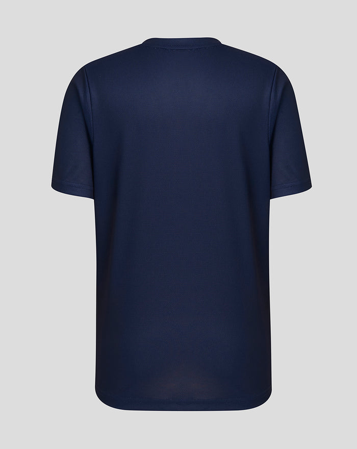 Close-up of navy junior performance tee showing neck trim branding and Lancashire Cricket crest on the chest.