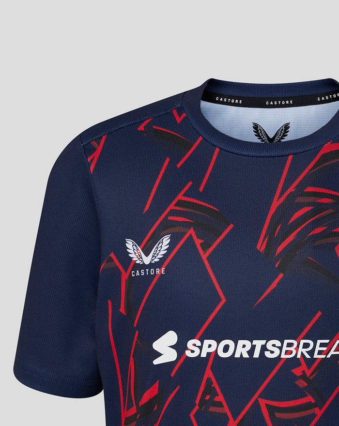 Back view of navy junior short sleeve performance T shirt with plain fabric.