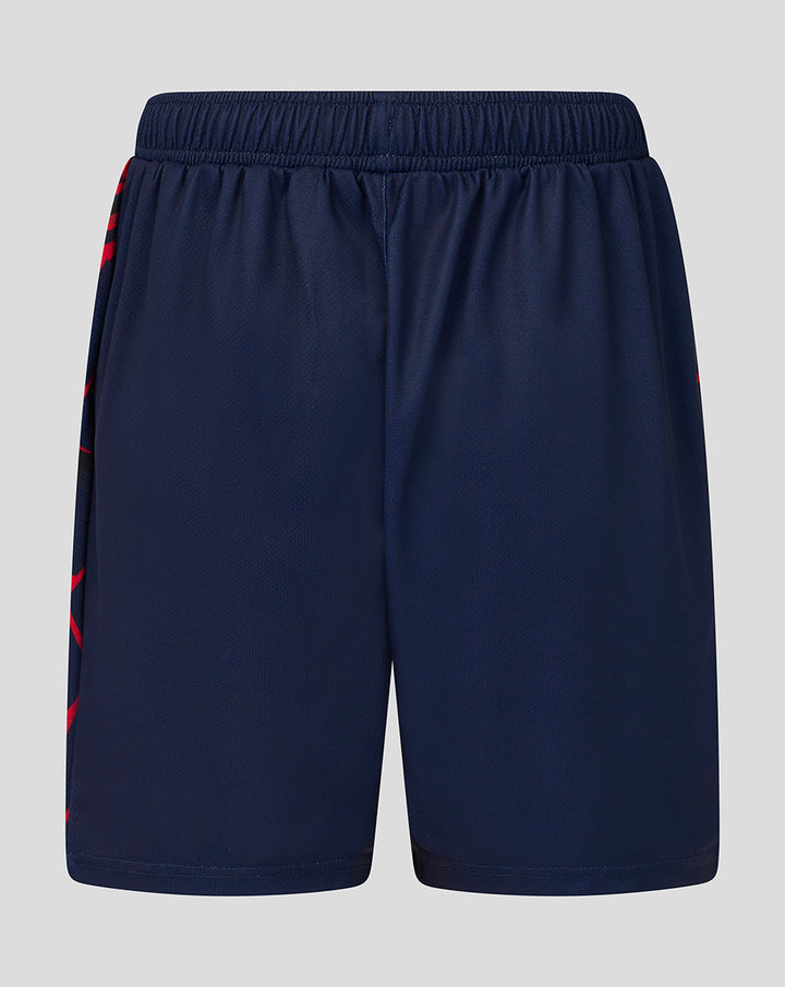 Back view of Junior 26/27 Performance Shorts in peacoat navy showing an elastic waistband and red side stripes