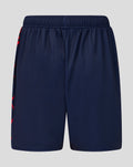 Back view of Junior 26/27 Performance Shorts in peacoat navy showing an elastic waistband and red side stripes