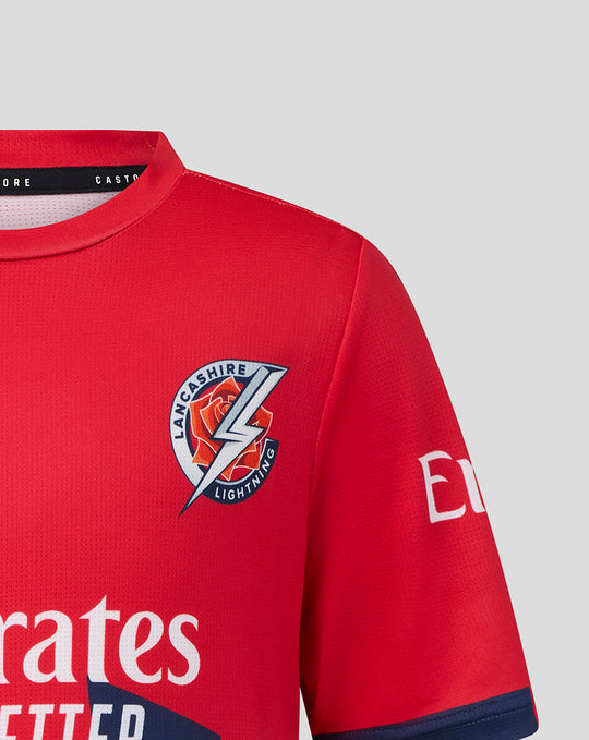 Junior red T20 short sleeve cricket jersey with Lancashire Lightning crest on the chest and Emirates sponsor logo