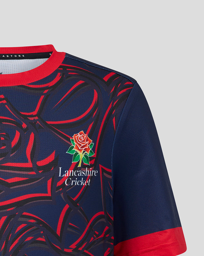 Shoulder and collar area of navy Peacoat jersey with red rose graphic and red trim