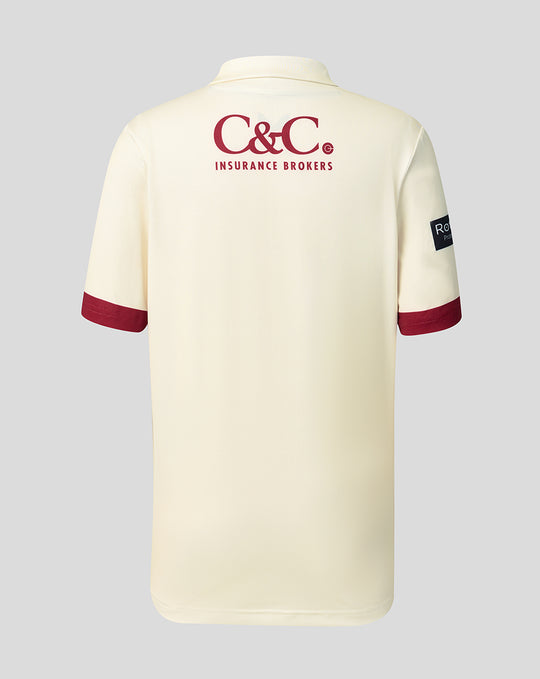 Back view of cream County Champs short sleeve jersey with C&C Insurance Brokers logo on the upper back.