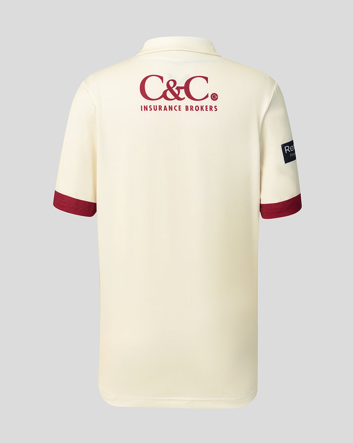 Back view of cream County Champs short sleeve jersey with C&C Insurance Brokers logo on the upper back.