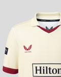 Cream jersey chest with red rose Lancashire Cricket crest and Castore collar detail.