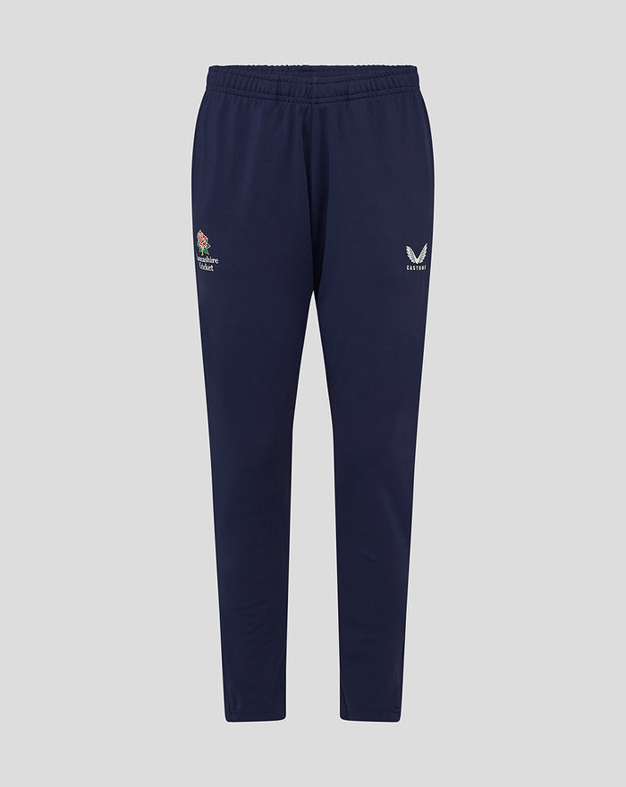 Navy junior Lancashire slim fit pant with elastic waistband and rose crest on left thigh and Castore logo on right
