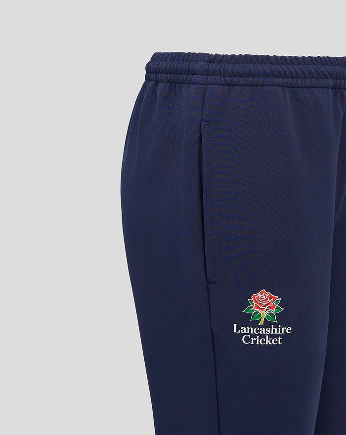 Side view of navy Lancashire track pants with a pocket and Lancashire Cricket crest on the thigh
