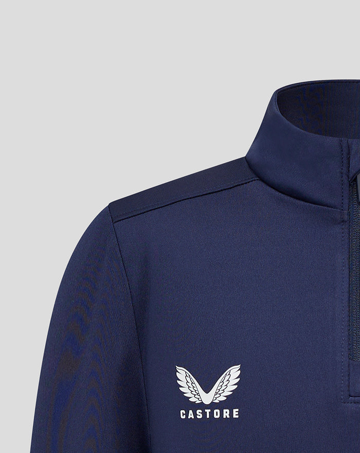 Close up of navy junior Lancashire quarter zip shoulder with Castore logo on the chest.