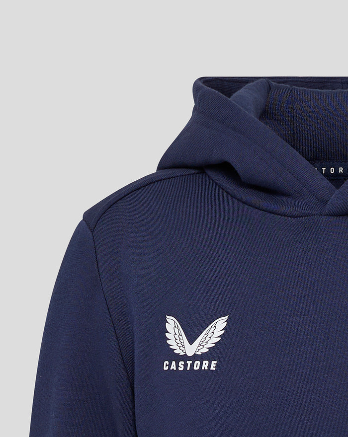 Close up of navy hoodie showing white Castore logo with wing emblem.