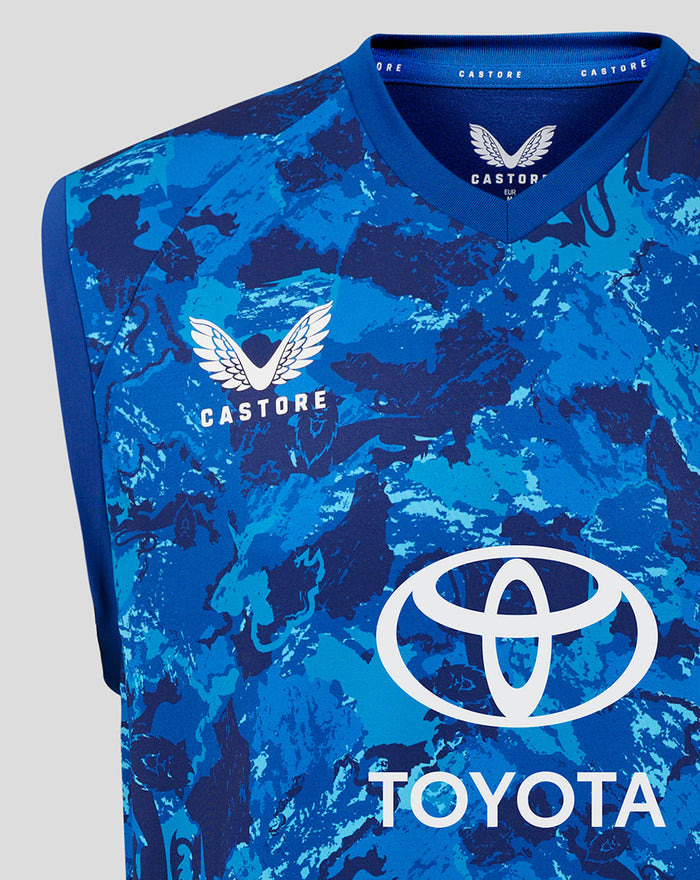 Blue camouflage sleeveless England cricket vest with Castore wings logo on the chest and a large Toyota emblem across the front