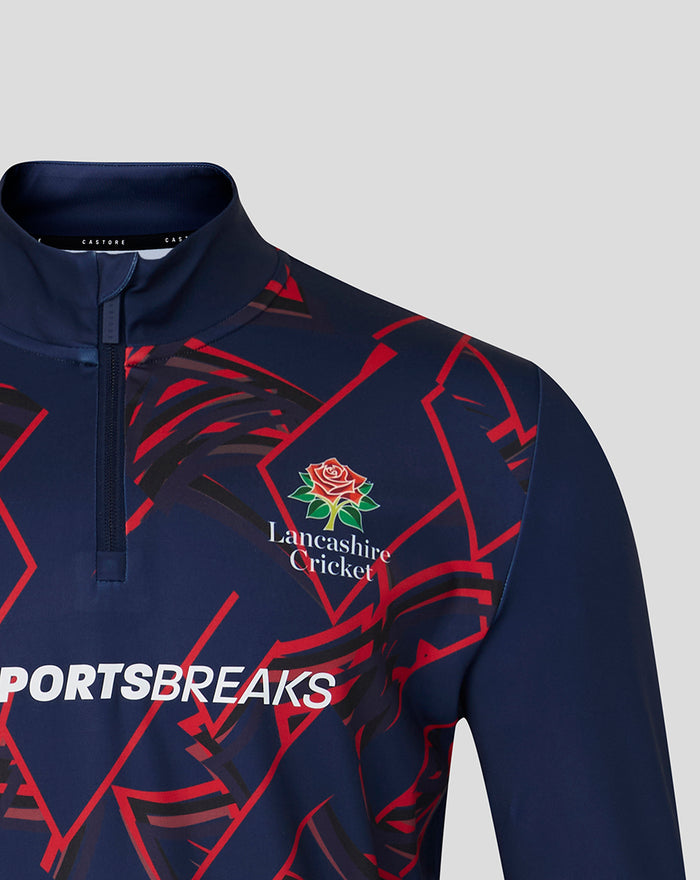 Navy peacoat quarter zip with geometric red pattern and Lancashire Cricket crest.
