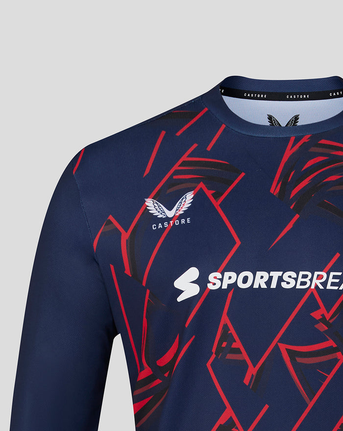 Navy long sleeve performance T shirt with bold red geometric pattern and Castore Sportsbreaks branding