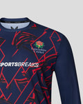 Navy long sleeve performance T shirt close up showing Lancashire Cricket rose crest and red geometric pattern
