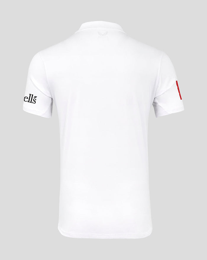 Front view of a white Test cricket shirt featuring a red collar detail and large Toyota sponsor logo.