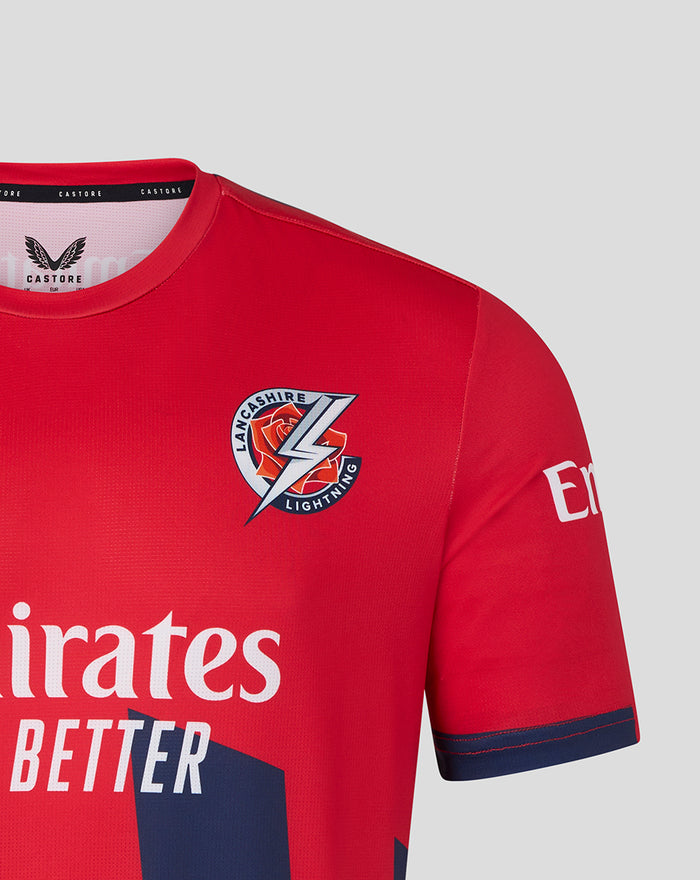Red T20 jersey showing Lancashire Lightning crest on the chest and Emirates Fly Better slogan across the front.