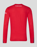 Back view of red long sleeve cricket jersey with Emirates logo across the upper back