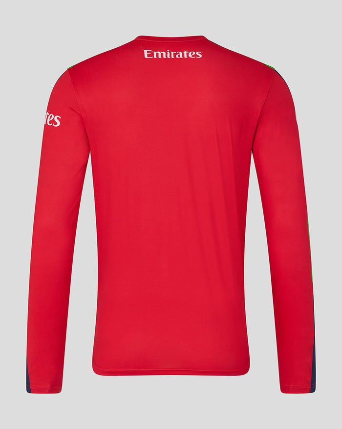 Back view of red long sleeve cricket jersey with Emirates logo across the upper back