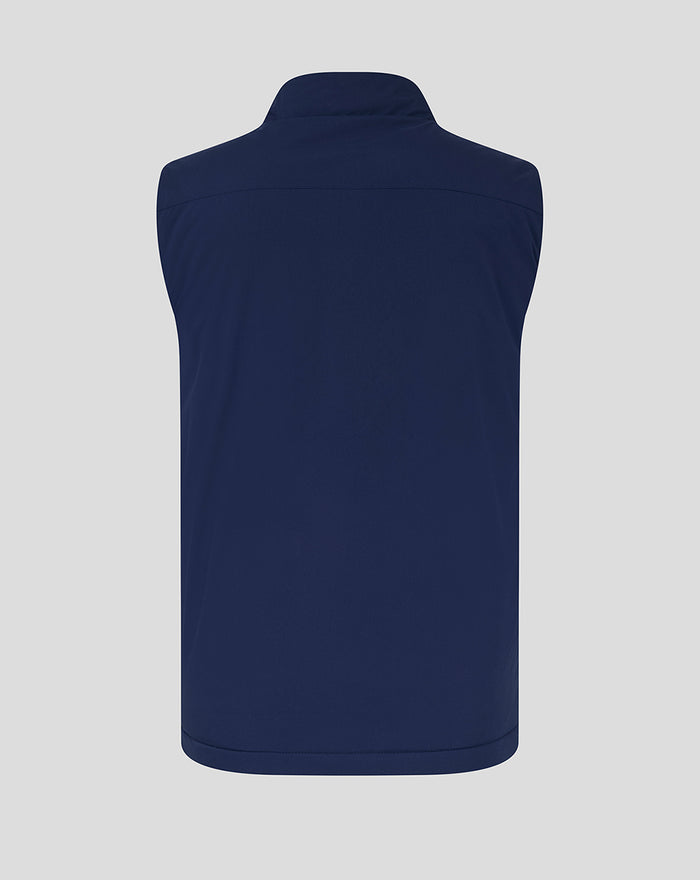Back view of navy padded gilet with high standing collar and clean smooth back panel.
