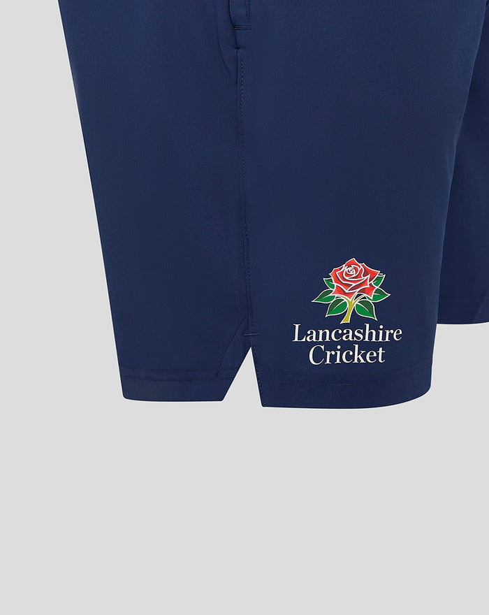 Close up of navy Lancashire Cricket shorts showing crest and Lancashire Cricket text at the hem