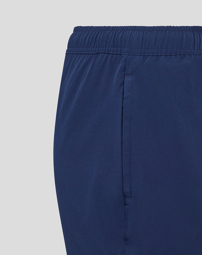 Side view of navy Lancashire Woven Training Short with a zip pocket