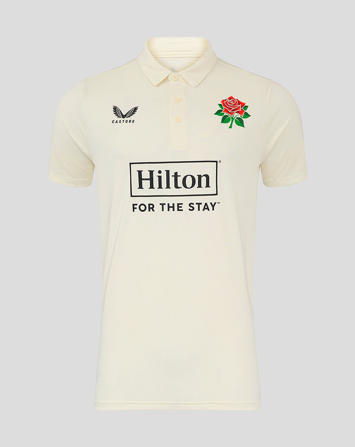 Beige short sleeve cricket polo with Hilton sponsor on the front rose crest on the chest and Castore logo on the opposite chest